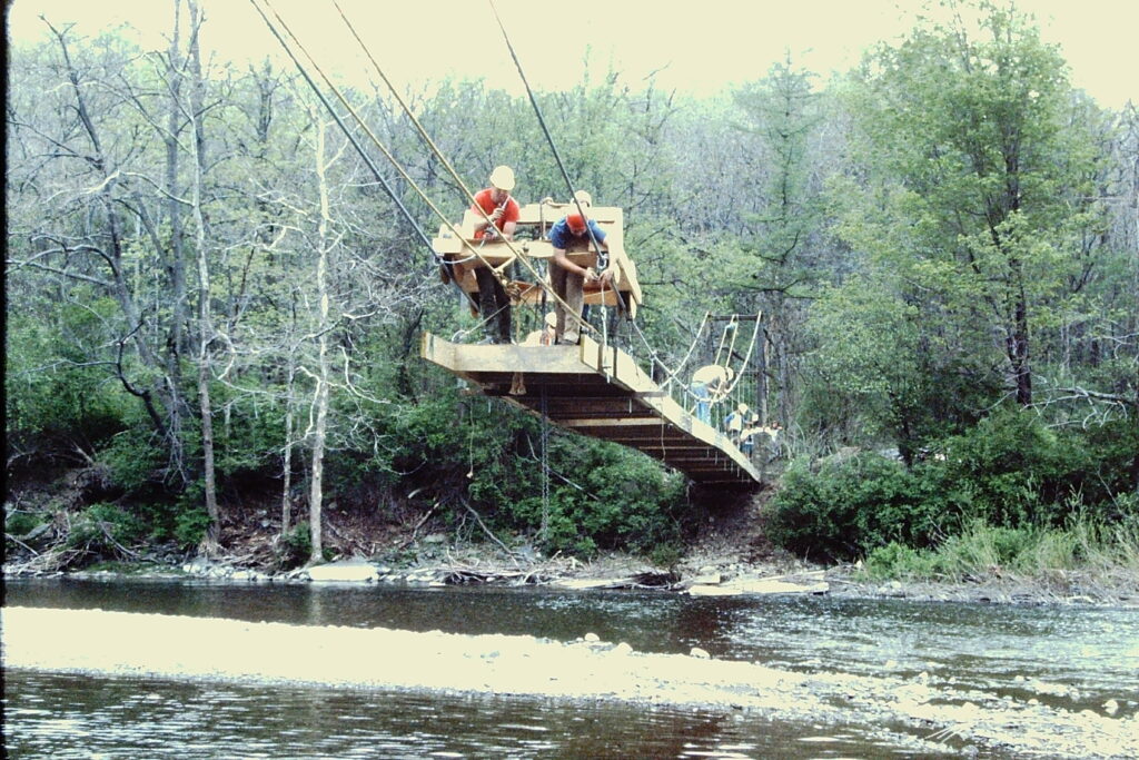 Cornell students building the Flat Rock Bridge in 1983